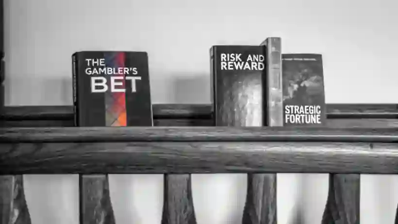 Collection of fiction books exploring gambling and strategic risk themes